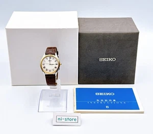 Seiko 8J41-0AJ0 Dolce Quartz Herrenuhr römische Zahl weißes Zifferblatt mit Box - Rang A - Bild 1 von 20