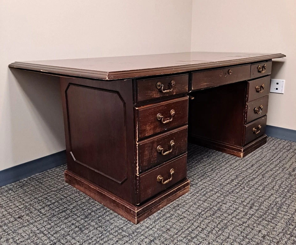 Used Real Mahogany wooden office desk, 5.75 ft W x 2.9 ft H, nine drawers - Image 1 of 1