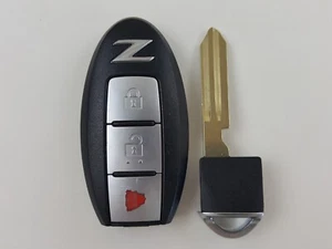 ORIGINAL NISSAN Z 370Z 09-22 OEM SMART KEY LESS ENTRY REMOTE FOB UNCUT BLANK CAR - Picture 1 of 14