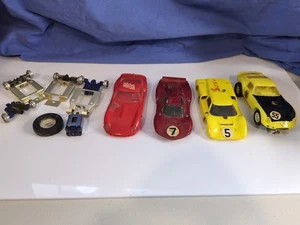 Kiste mit diversen Slotcar Teilen - inkl. Revell Chassis #81523 - Konvolut - Bild 1 von 11