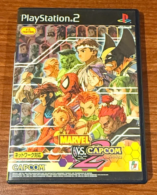 Marvel vs Capcom 2 (JP PlayStation 2, 2002) в коробке - Изображение 1 из 3