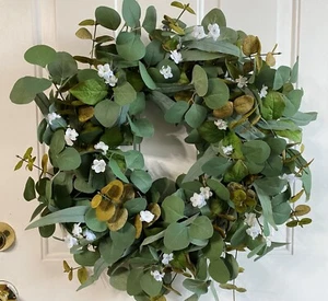 Handmade Leafy Greenery with a hit of Baby Breath on a grapevine Wreath - Picture 1 of 3