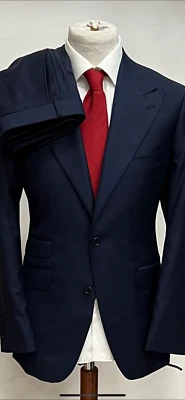 Traje de lana Cerruti Super 150 azul marino liso con solapa de pico/bolsillo para boletos Foto 1 de 4