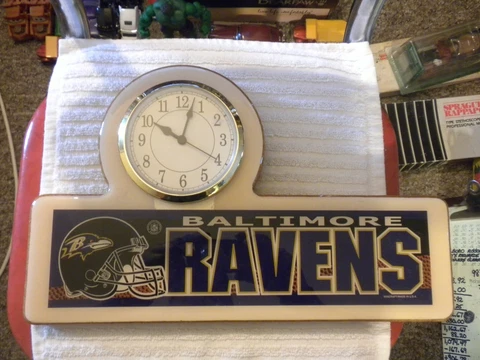 NFL BALTIMORE RAVENS BATTERY OPERATED WALL CLOCK WORKING CONDITION 13 1/2x8 1/2 Cover