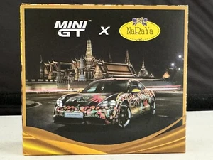 MINI GT SPECIAL EDITION PORSCHE TAYCAN TURBO S NARAYA EDITION 1/64 MGT00399 - Picture 1 of 8