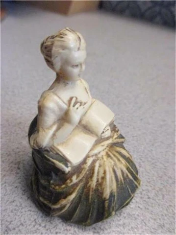 Vintage Celluloid Tape Measure Lady Sitting  Reading-Cream with Antiquing = 198m Cover