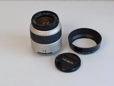 Lente de enfoque automático zoom MINOLTA AF 35-80 mm f/4-5,6 y 1 tapa de lente ~ Usado Foto 1 de 4