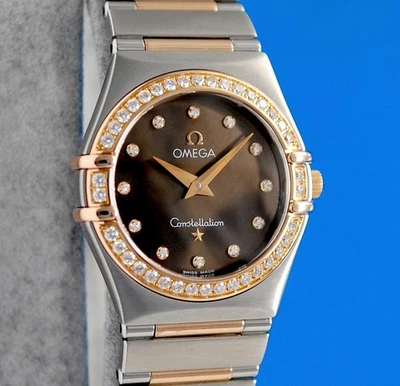 Reloj Omega Constellation para dama de oro rosa de 18 quilates - esfera marrón - diamantes - 1358,60 Foto 1 de 4