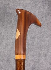 Hand carved hiking beating stick in walnut with maple inlay