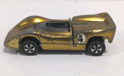 Lote original Red Line Hot Wheels Gold Mclaren M6A #626 Foto 1 de 4