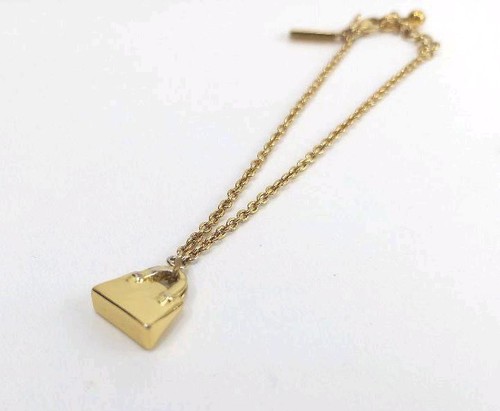 bracciale oro kate spade new york motivo borsa