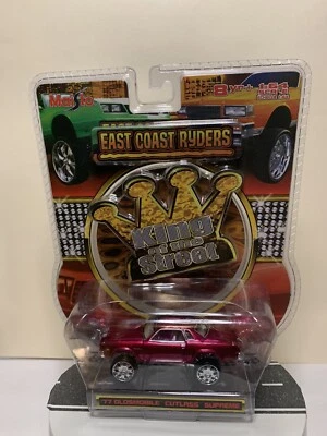 Oldsmobile Cutlass Supreme rojo magenta metálico Maisto King of the Street 77 Foto 1 de 4