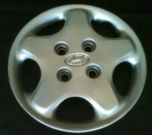 Cubiertas de rueda tapacubos: 1997-1998-1999 Hyundai Tiburon 14" - Imagen 1 de 3