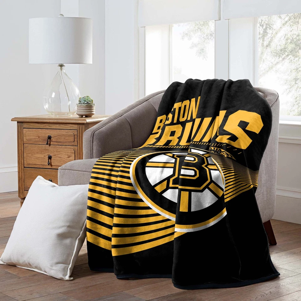 Manta Raschel 60" x 80" Boston Bruins con licencia oficial de la NHL Foto 1 de 4