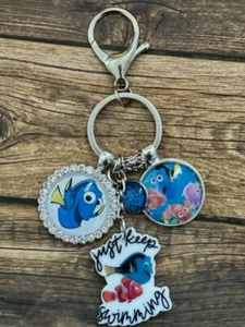 Key Chain Zipper Pull Glass Dome Cabochon Just Keep Swimming Dory Glitter RTS - Picture 1 of 1