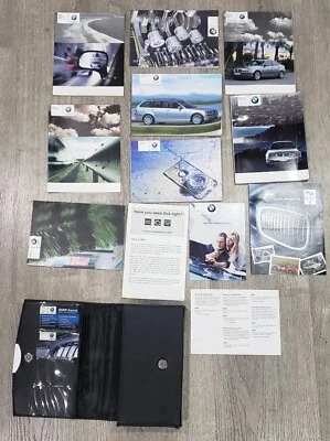 BMW E46 325xi 2004 camioneta manuales del propietario libros de operador con estuche de cuero equipamiento Foto 1 de 4