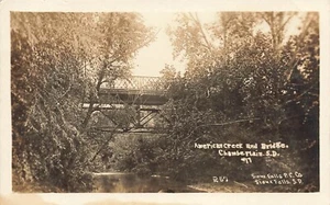 Postal LP72 Chamberlain South Dakota American Creek and Bridge RPPC 1911 - Imagen 1 de 2