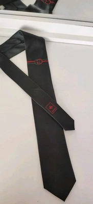 Corbata GUCCI entrelazada con logotipo GG negra usada  Foto 1 de 4
