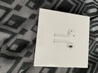 Apple AirPods White Headsets with Charging Case. (Sealed and brand new)