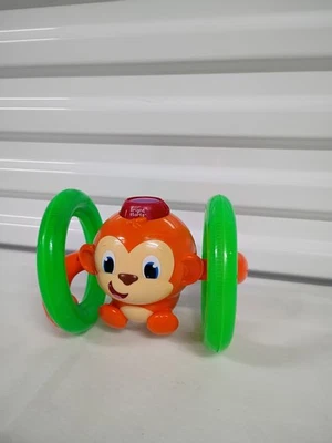 "Juguete musical iluminado para niños Kids II Bright Stars Rolling Monkey funciona 7""" Foto 1 de 3