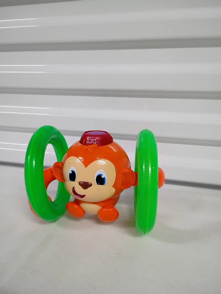 "Juguete musical iluminado para niños Kids II Bright Stars Rolling Monkey funciona 7""" Foto 1 de 3
