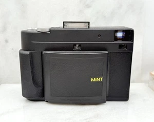 Fotocamera InstantKon RF70 pellicola istantanea come nuova con 4 confezioni di pellicola - Foto 1 di 6