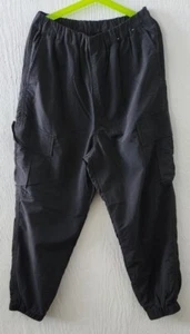 Pantaloni cargo jogger UNIQLO bambini taglia 11-12 neri vita elastici foderati unisex - Foto 1 di 9