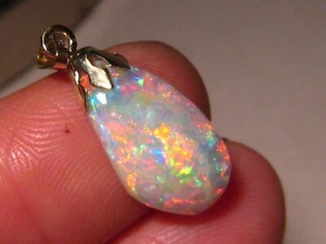 3 ct. Opal Pendant - 14 k yellow gold - Red and Blue gem opal - Picture 1 of 11