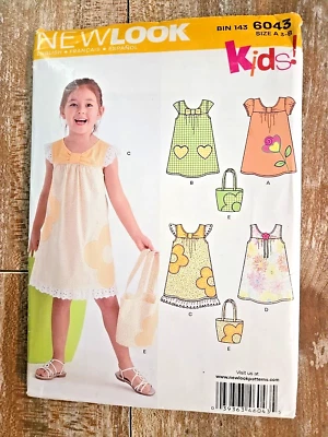 New Look Sewing Pattern 6043 Childs Girls Sundresses Bags Sizes 3-8 Uncut - Image 1 of 2