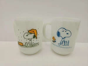 PAIR OF FIRE KING ANCHOR HOCKING SNOOPY MILK GLASS MUGS VERY COLLECTABLE. - Picture 1 of 12