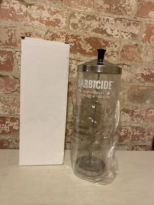 Tarro desinfectante de barbicidas Foto 1 de 4