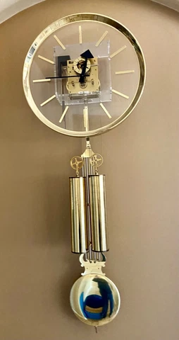 Howard Miller 1970s Lucite and Brass Wall Clock by George Nelson - Vintage Cover