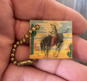 Vintage Vari-Vue Cowboy on Bucking Bronco Keychain - Picture 1 of 2