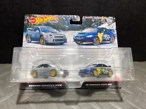 1/64 Hot Wheels Juego de 2 coches Subaru Impreza WRX y 2016 Subaru WRX STi Paquete de 2 - Imagen 1 de 2