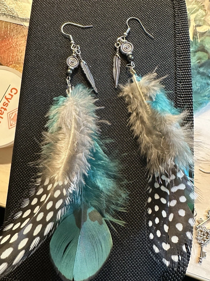 Pendientes colgantes de plumas de plata Foto 1 de 2