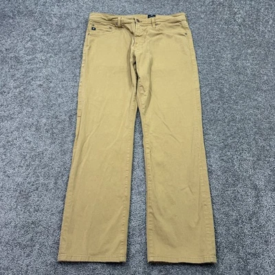 Calça masculina AG Adriano Goldschmied 34x34 bronzeada The Graduate perna sob medida cáqui cidade - Imagem 1 de 4