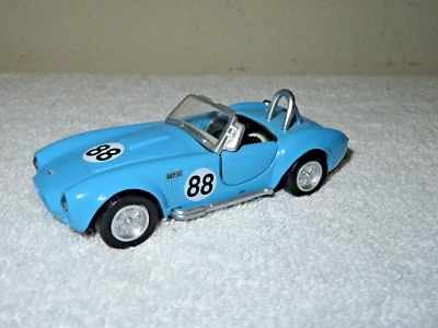 1966 SHELBY COBRA NEW RAY 1:32 METAL DIE CAST OPENING PARTS & PULL BACK ACTION - Image 1 of 4
