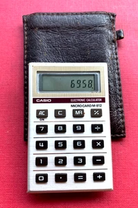 CASIO MICRO CARD M-812 ELECTRONIC CALCULATOR VINTAGE MADE JAPAN - Picture 1 of 12