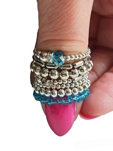Boho Stacking Stretch Rings Glass Beaded Summer Silver Turquoise Blue Set of 7 - Picture 1 of 5