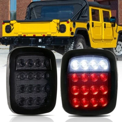 Par de luces traseras LED de lente ahumada freno de parada inversa para 2001 AM General Hummer H1 Foto 1 de 4