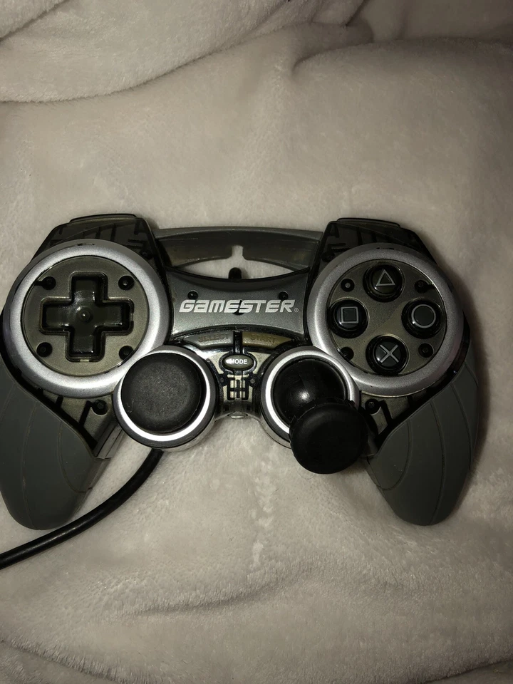 🎮 Controle com fio Radica Gamester para PS2 cinza prata apenas para peças 🎮 - Imagem 1 de 1