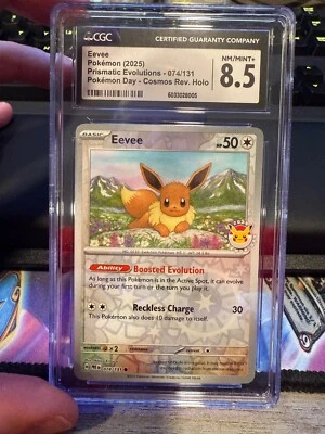 Eevee Pokemon Day Reverse Cosmos 074/131 Prismatic Evolutions CGC 8.5 NM/Mint+ - Image 1 of 2