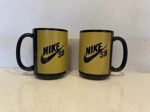 Nike SB black And Gold Coffee Mug Lot Of 2 - Picture 1 of 3