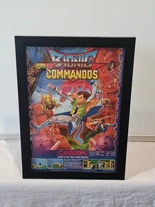 Bionic Commando Amiga Amstrad Spectrum C64 PÓSTER DE JUEGO ANUNCIO ENMARCADO A4 8X12" - Imagen 1 de 2