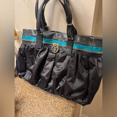 Bolso de mano vintage HENRI BENDEL. Bolso de mano negro satinado/turquesa y cuero Foto 1 de 4