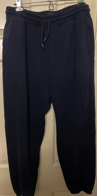 Pantalones deportivos para hombre H&M calce relajado talla mediana azul marino cómodos sudaderas gruesas Foto 1 de 4