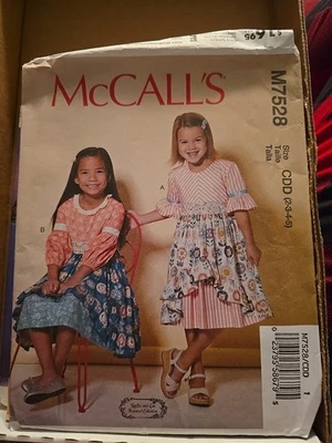 McCall's 7528 Girl Pullover Dress Sewing Pattern with Overskirt * Size: 2- 5 - Image 1 of 2