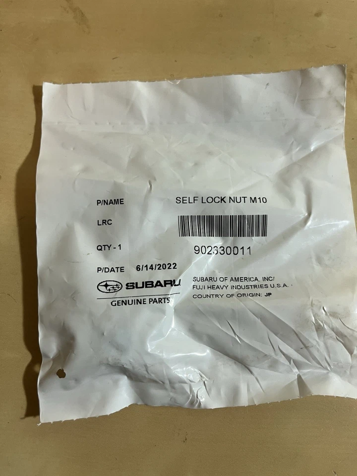 Silenciador y tuerca de tubo originales Subaru 902330011/9023300119R Foto 1 de 2