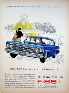 Oldsmobile F-85 Automobil nachtblau Autodruck Werbung gelbe Scheune Jagdhunde 1963 - Bild 1 von 1