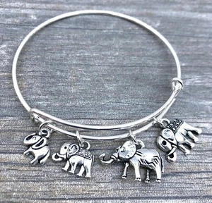Familia de elefantes de 4 amuletos de plata Pulsera de brazaletes expandible - Imagen 1 de 3